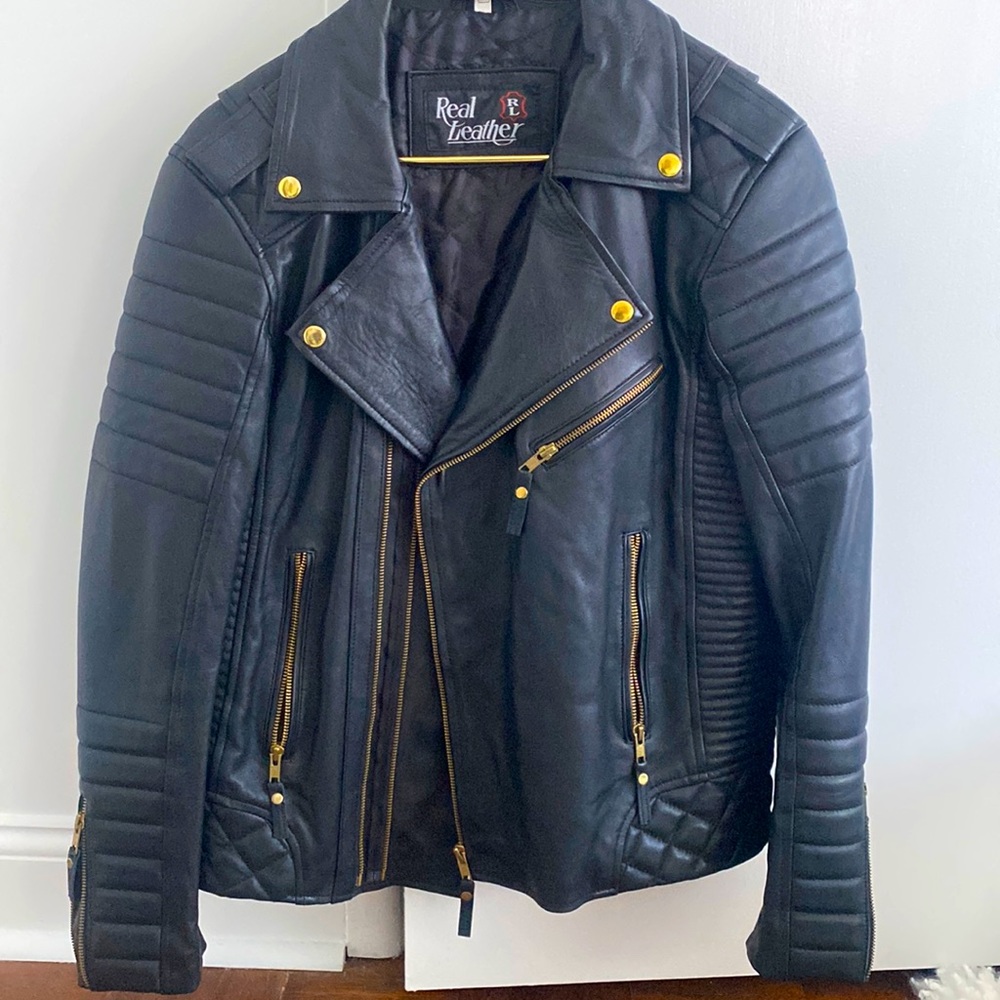 Black leather jacket with gold zippers. Size M